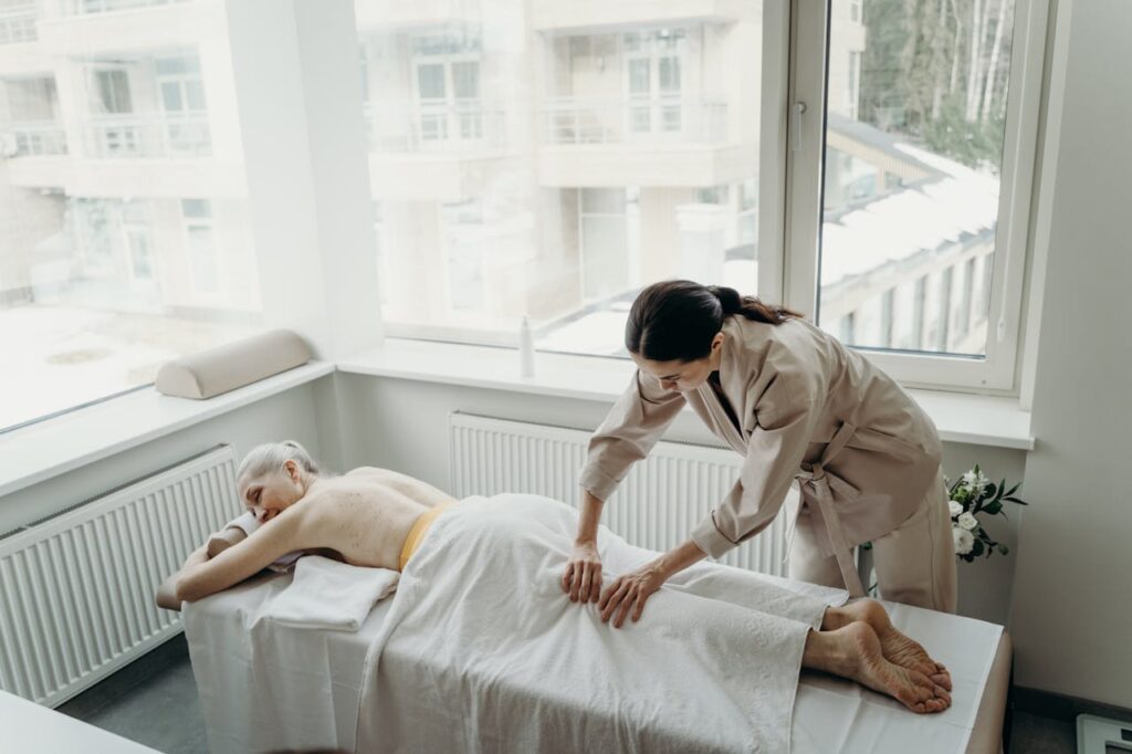 A Woman in a Spa Having a Massage